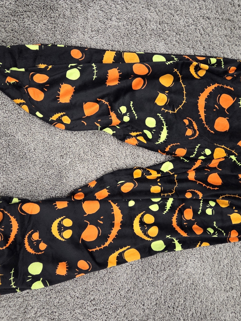 Black Halloween Pumpkin Face Leggings with Orange and Lime Print